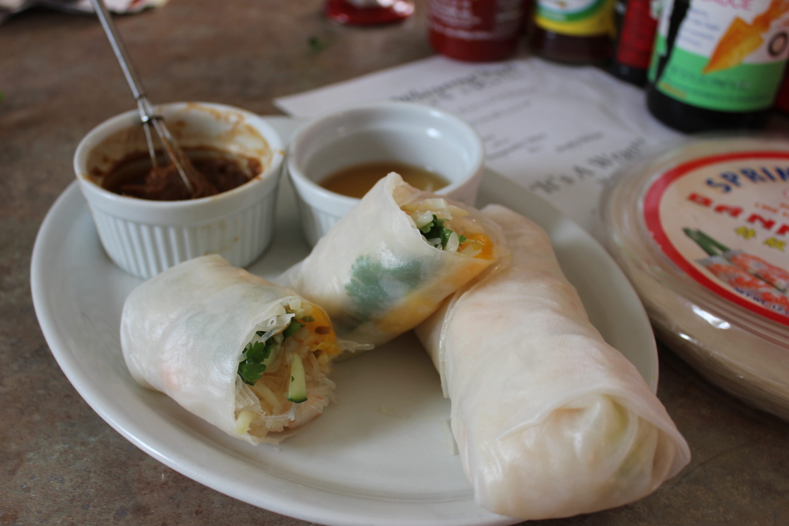 Thai Spring Rolls with dipping sauce and ingredients